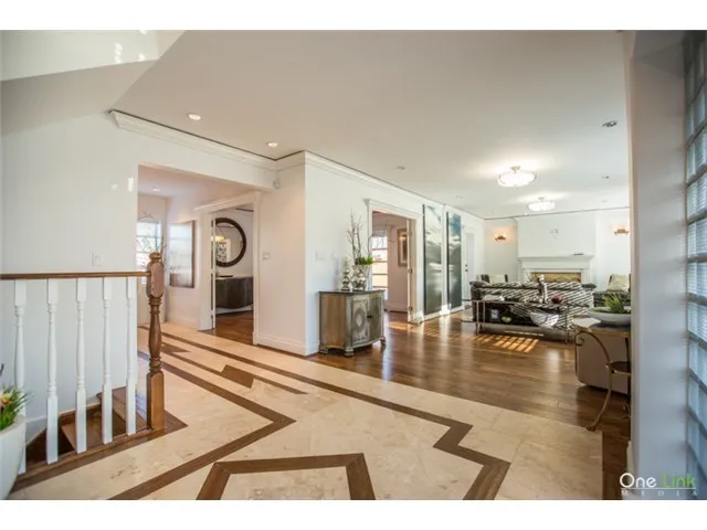 Entry foyer with patterned marble floor at 1519 W 33rd Avenue Vancouver — Peter Cardew-designed home, 100% interior design and finishes by DELANA Interiors