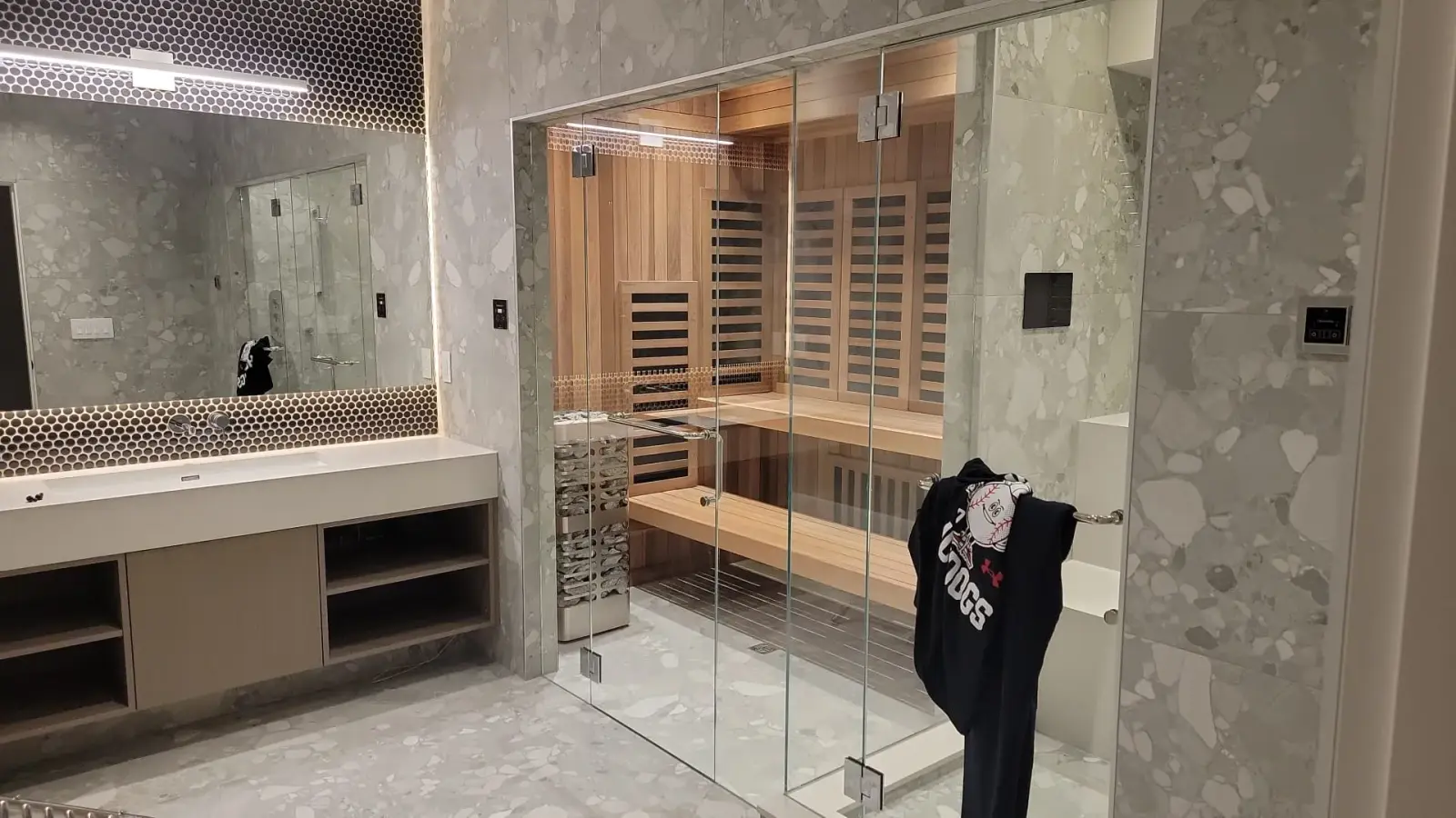Luxury spa bathroom with cedar infrared sauna, hexagon tile backsplash and floating vanity — bathroom renovation Vancouver